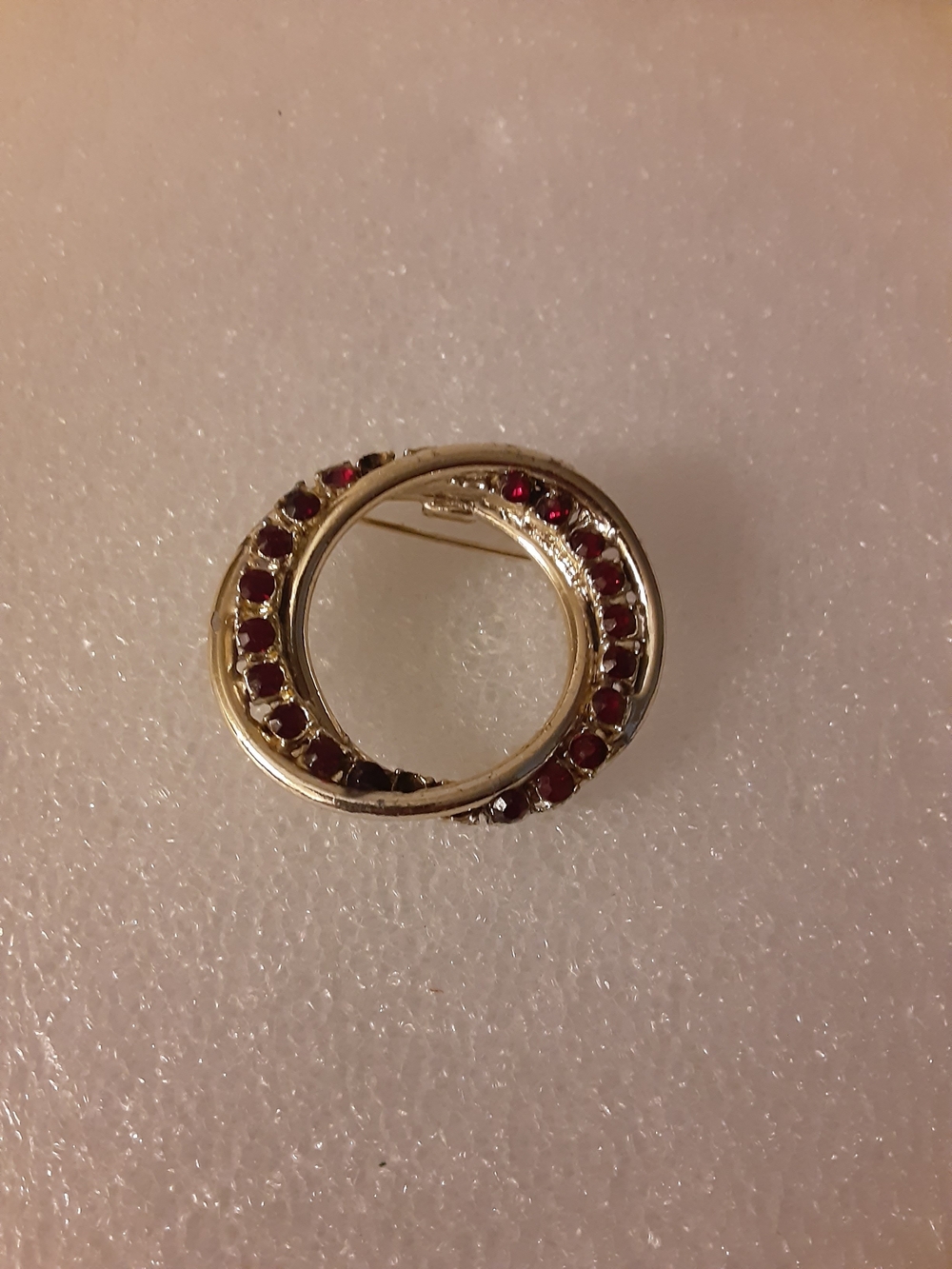 Gold-Tone Circle Brooch with Red Stones